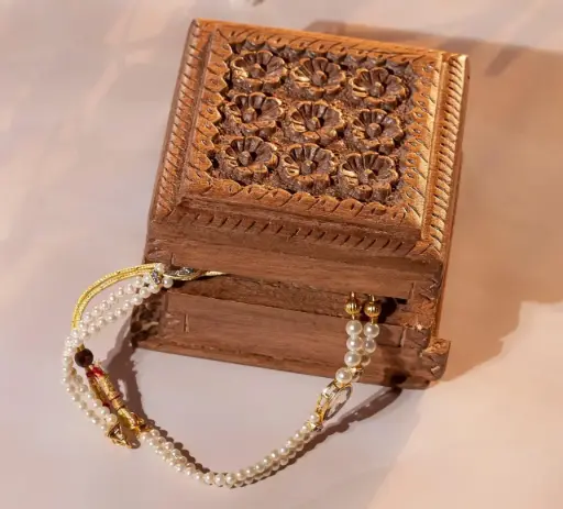 Walnut wood hand carved Jewellery box with floral motifs on top